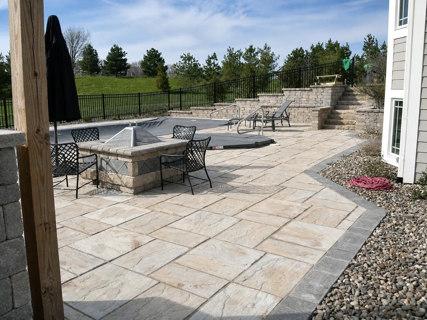 A finished paver patio by Elevated Landscape Services, Oconomowoc